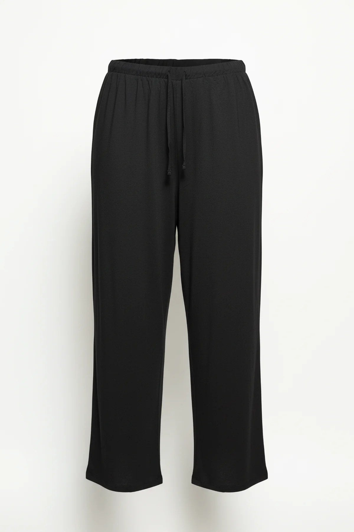 Weit geschnittene Hose mit Kordelzug und ohne Taschen.