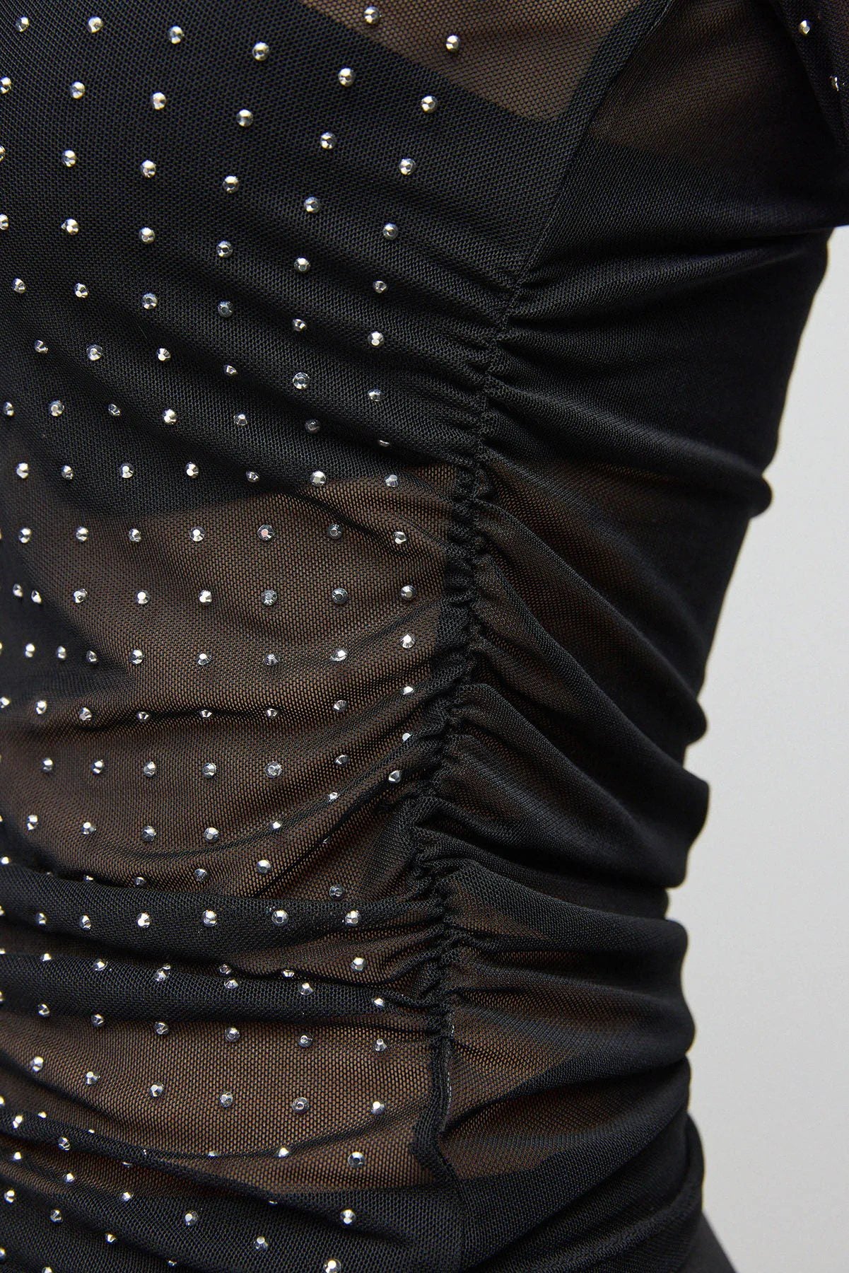 Bluse mit Steinmuster