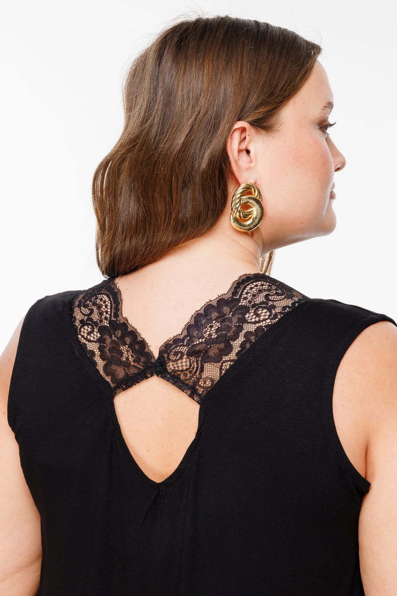 Ärmellose Bluse mit V-Ausschnitt und Spitzendetails