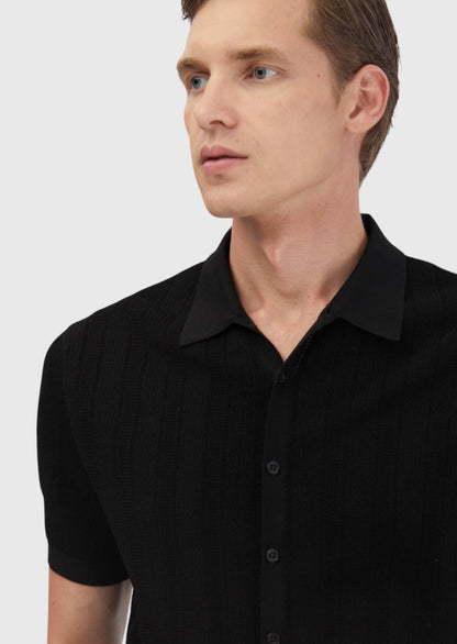 Schwarzer Jacquard-Cardigan mit Polokragen
