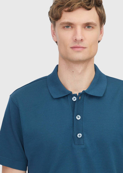 Petrolblaues, einfarbiges Polo-Shirt aus 100 % Baumwolle