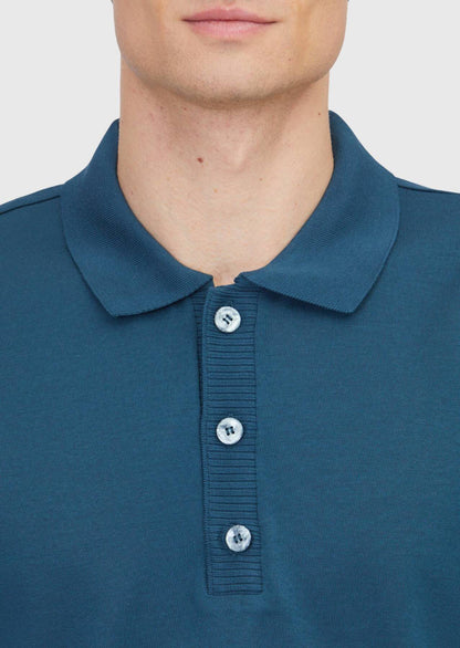 Petrolblaues, einfarbiges Polo-Shirt aus 100 % Baumwolle