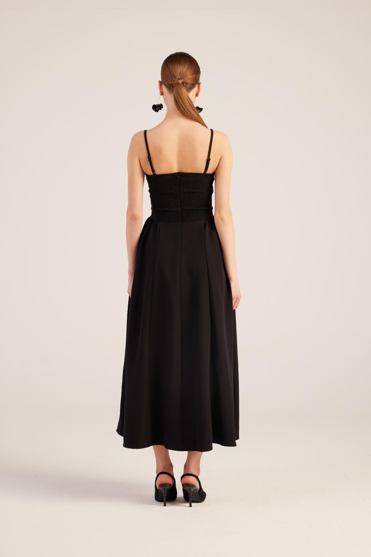 Langkleid mit Trägern