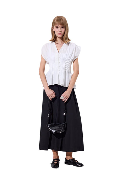 Ärmellose Bluse mit plissiertem Taillendetail, ecru.