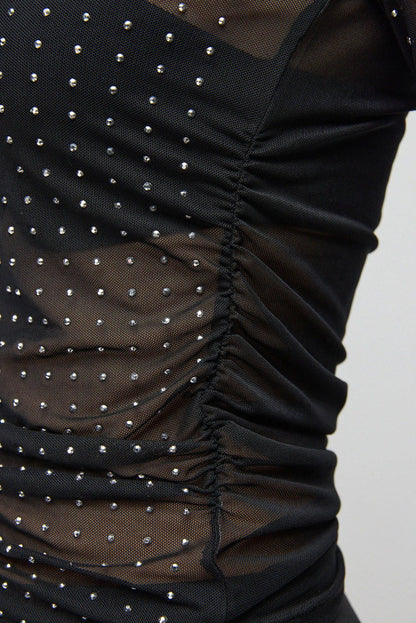 Bluse mit Steinmuster