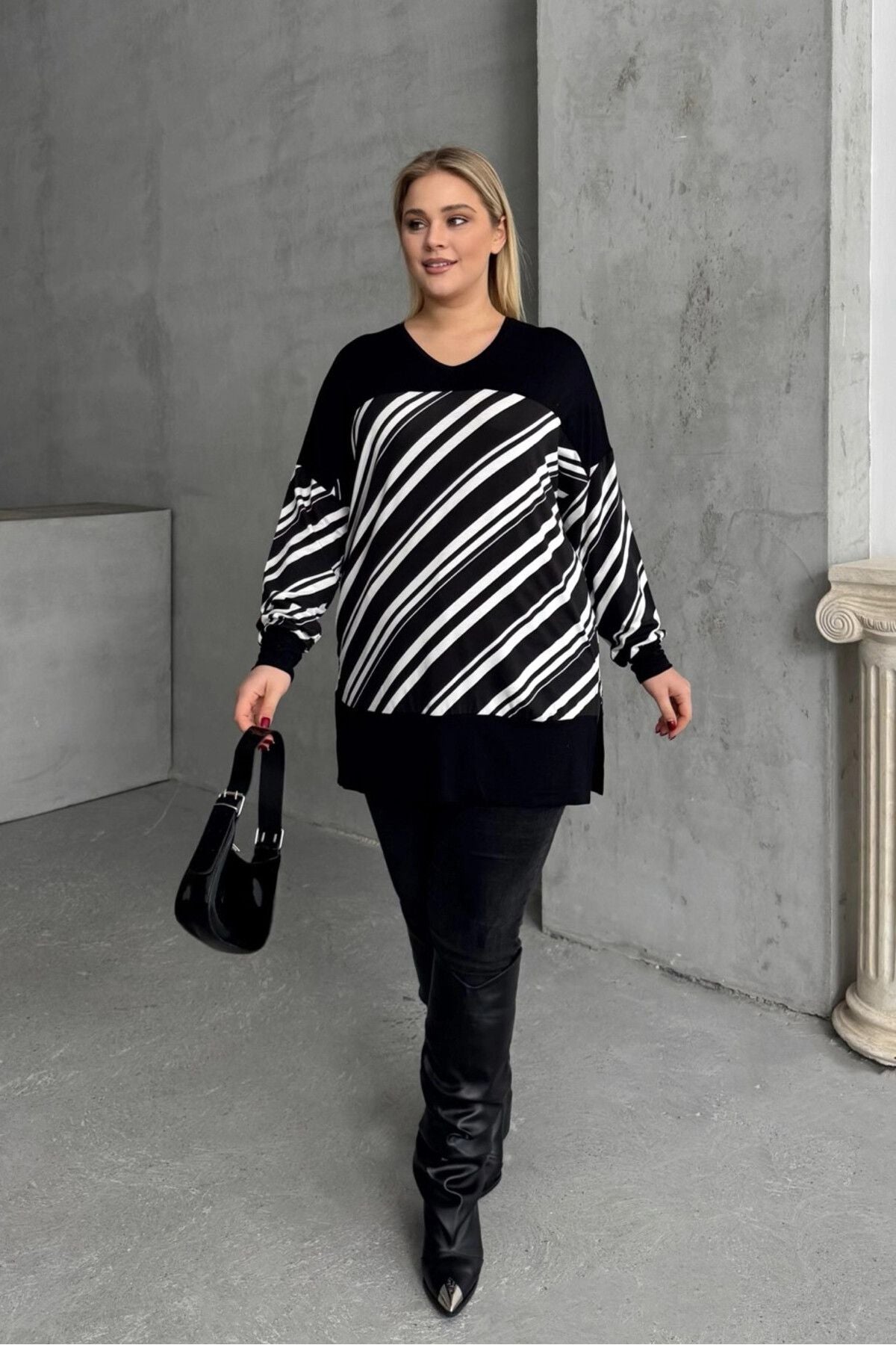 Plus-Size-Bluse mit V-Ausschnitt, langen Ärmeln, elastischen Bündchen und Schlitzen