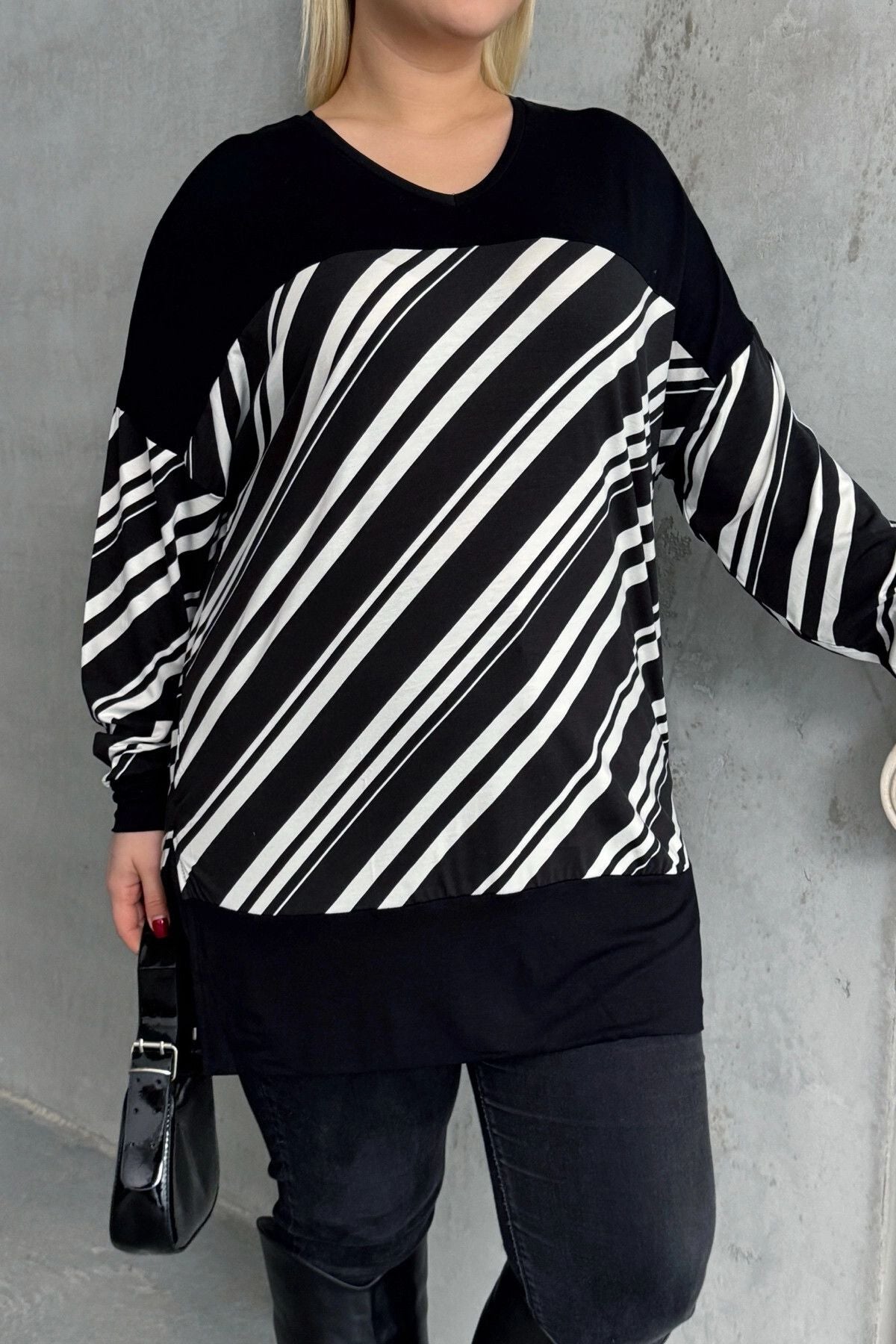 Plus-Size-Bluse mit V-Ausschnitt, langen Ärmeln, elastischen Bündchen und Schlitzen