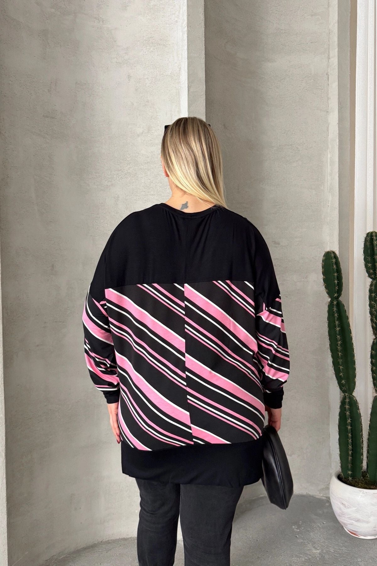 Plus-Size-Bluse mit V-Ausschnitt, langen Ärmeln, elastischen Bündchen und Schlitzen