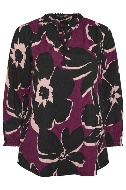 Lange Bluse mit Blumenmuster in großen Größen und Bindekragen