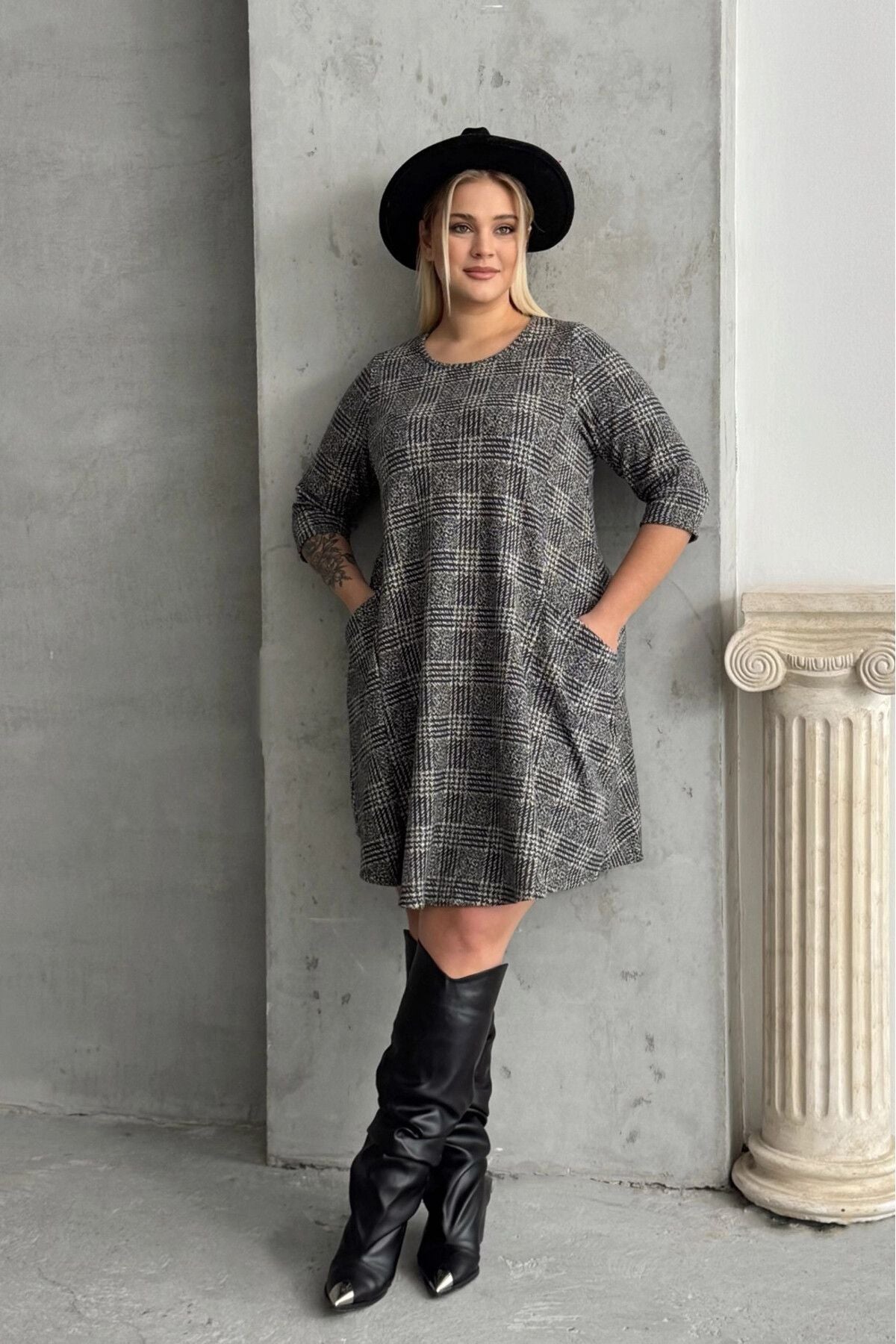 Plus-Size-Kleid mit kurzen Ärmeln, Rundhalsausschnitt, asymmetrischem Schnitt und Taschen