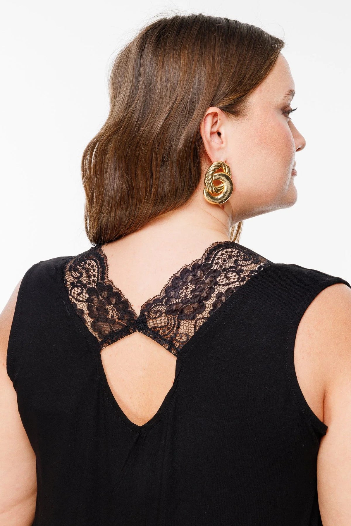 Ärmellose Bluse mit V-Ausschnitt und Spitzendetails
