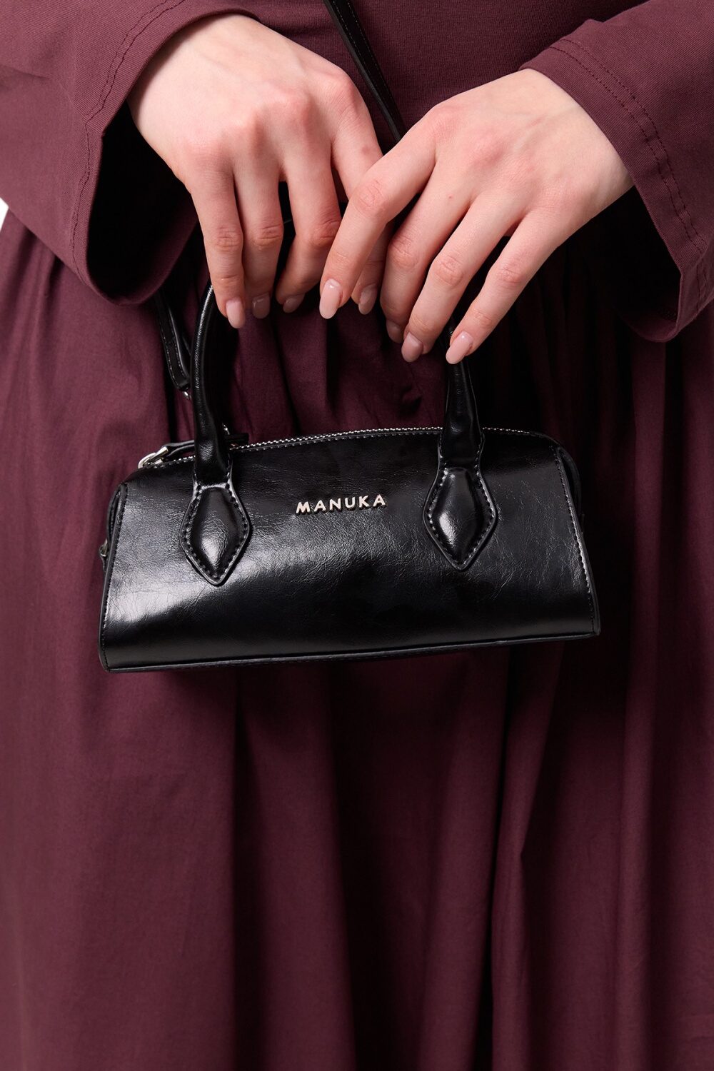 Schwarze Polo-Mini-Tasche aus Leder