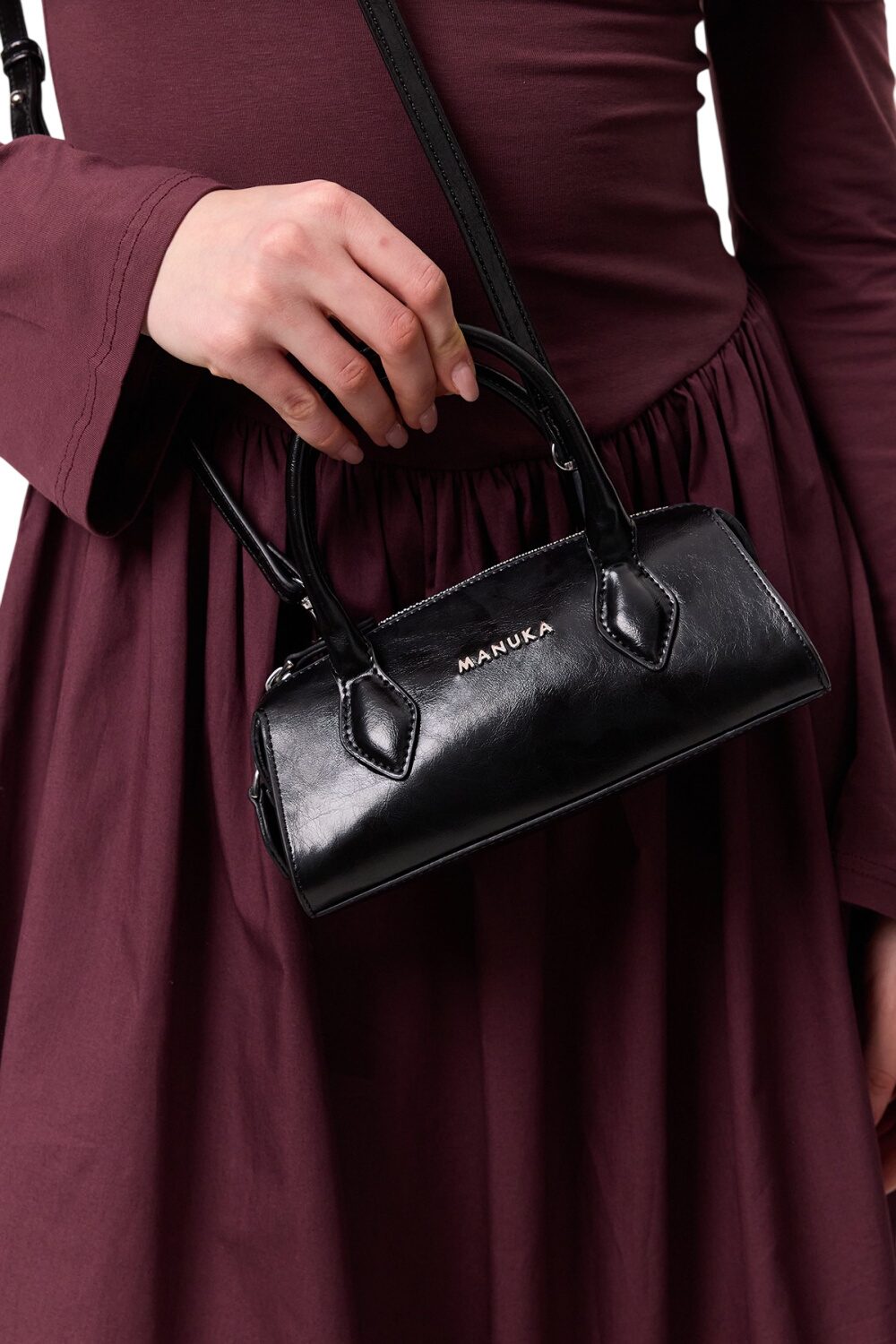 Schwarze Polo-Mini-Tasche aus Leder