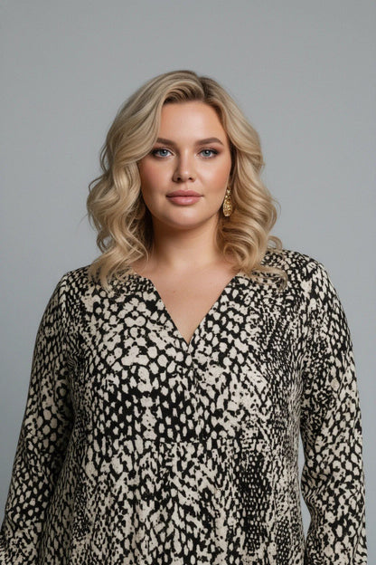 Gemustertes Kleid mit Taschendetails