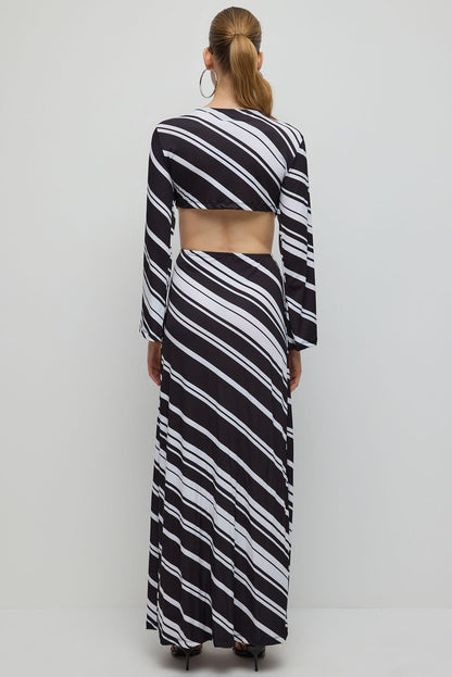 Gemustertes langes Kleid mit tiefem Schlitz