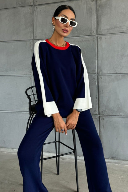 Zweiteiliges Set aus gestreiftem Pullover und Hose mit Schlitz und Übergröße