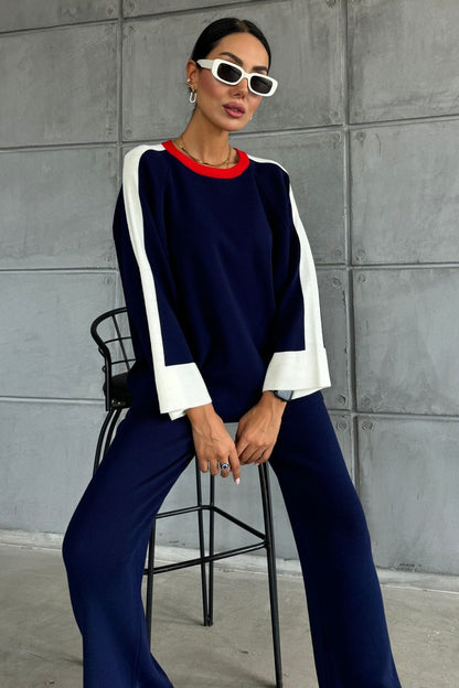 Zweiteiliges Set aus gestreiftem Pullover und Hose mit Schlitz und Übergröße