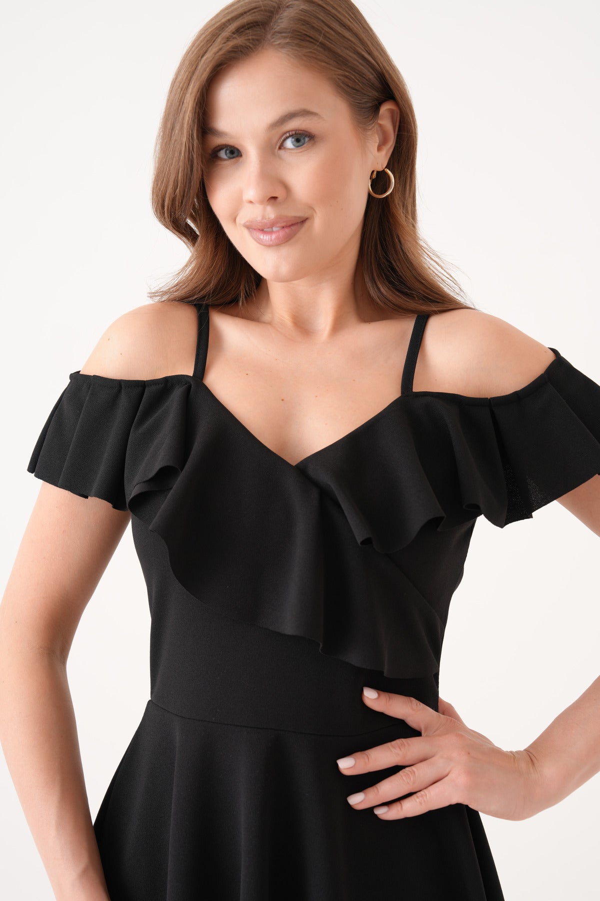 Kleid mit dünnen Trägern und ausgestelltem Rock
