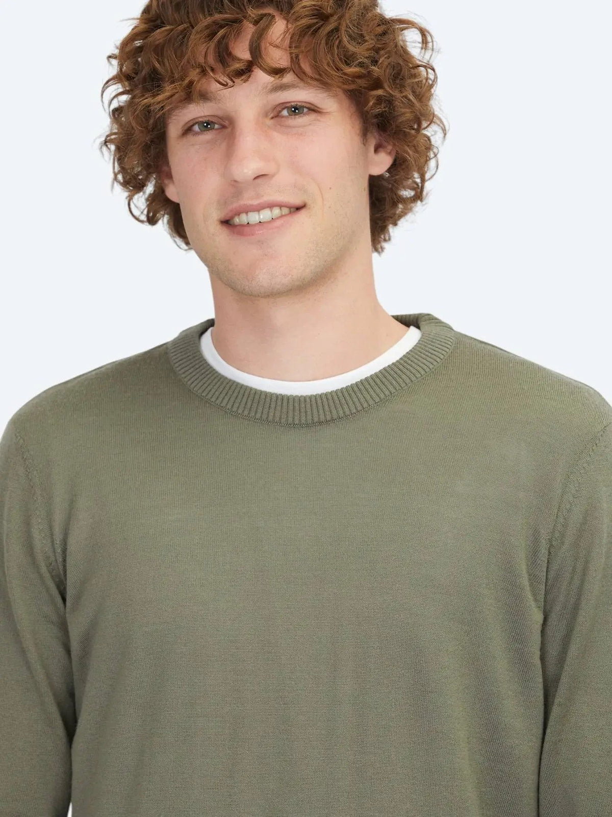 Hellgrüner Strickpullover