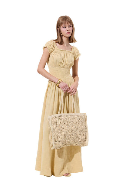 Rüschenkleid aus Musselin, beige
