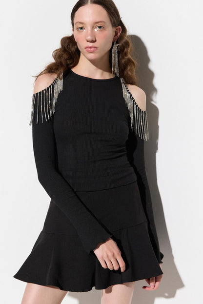 Bluse mit steinverzierten Schultern