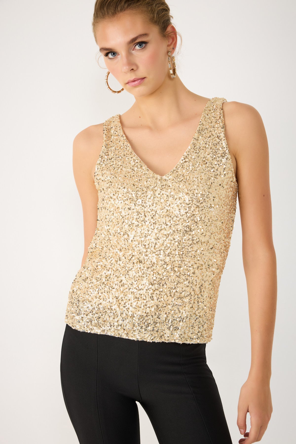 Paillettenbesetzte Bluse mit V-Ausschnitt