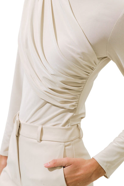 SCHWARZE BLUSE MIT CAPE-DETAIL
