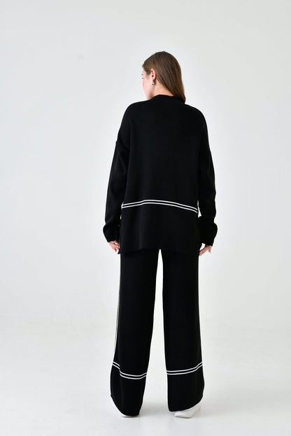 Zweiteiliges Strickset aus Oversize-Pullover und hochgeschnittener Hose