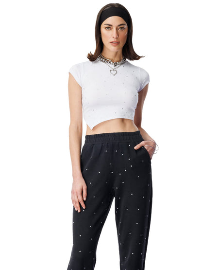 Asymmetrisches Crop-Top mit Steinverzierungen