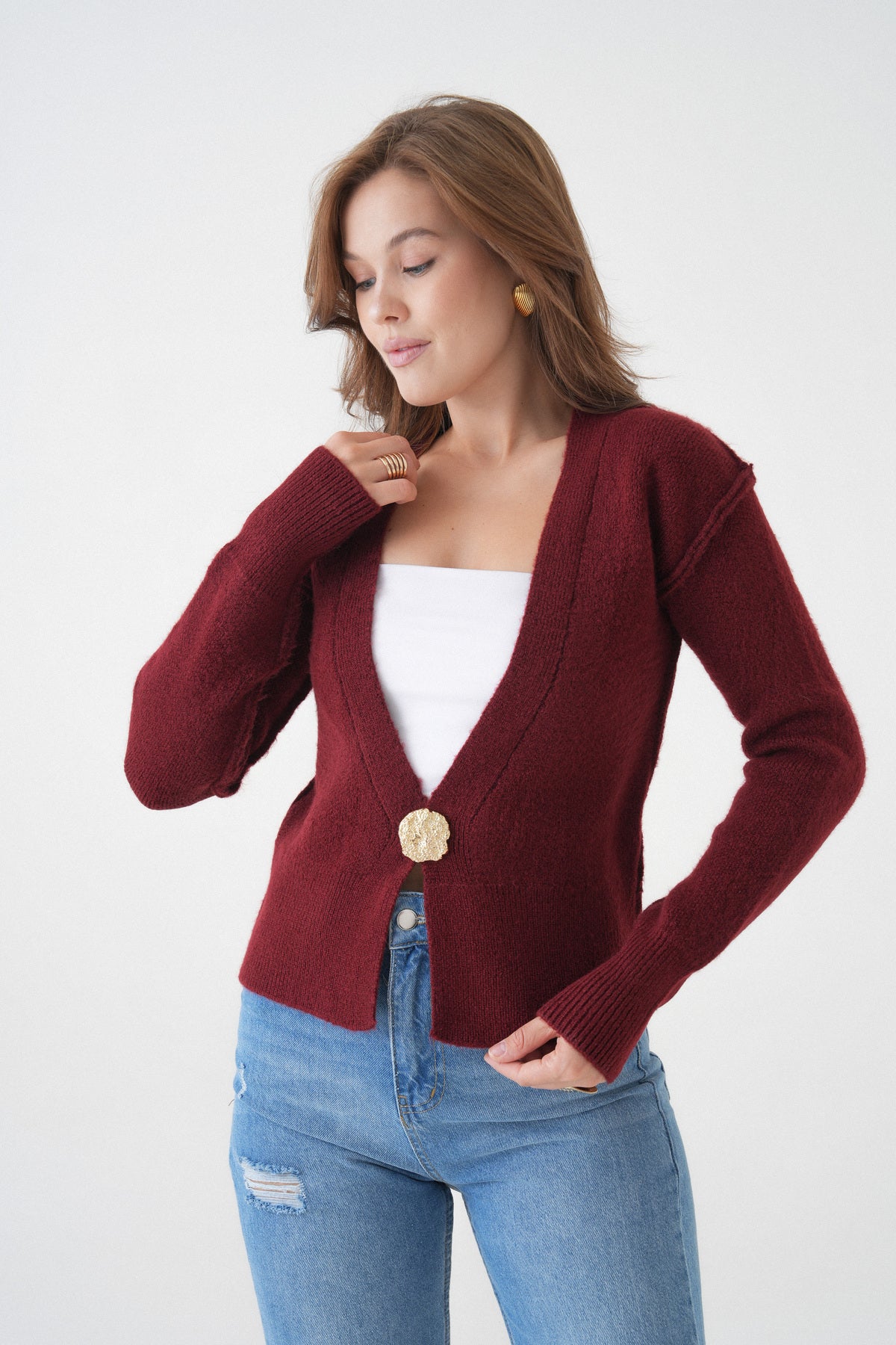 Langärmelige Strickjacke mit einem Knopfdetail
