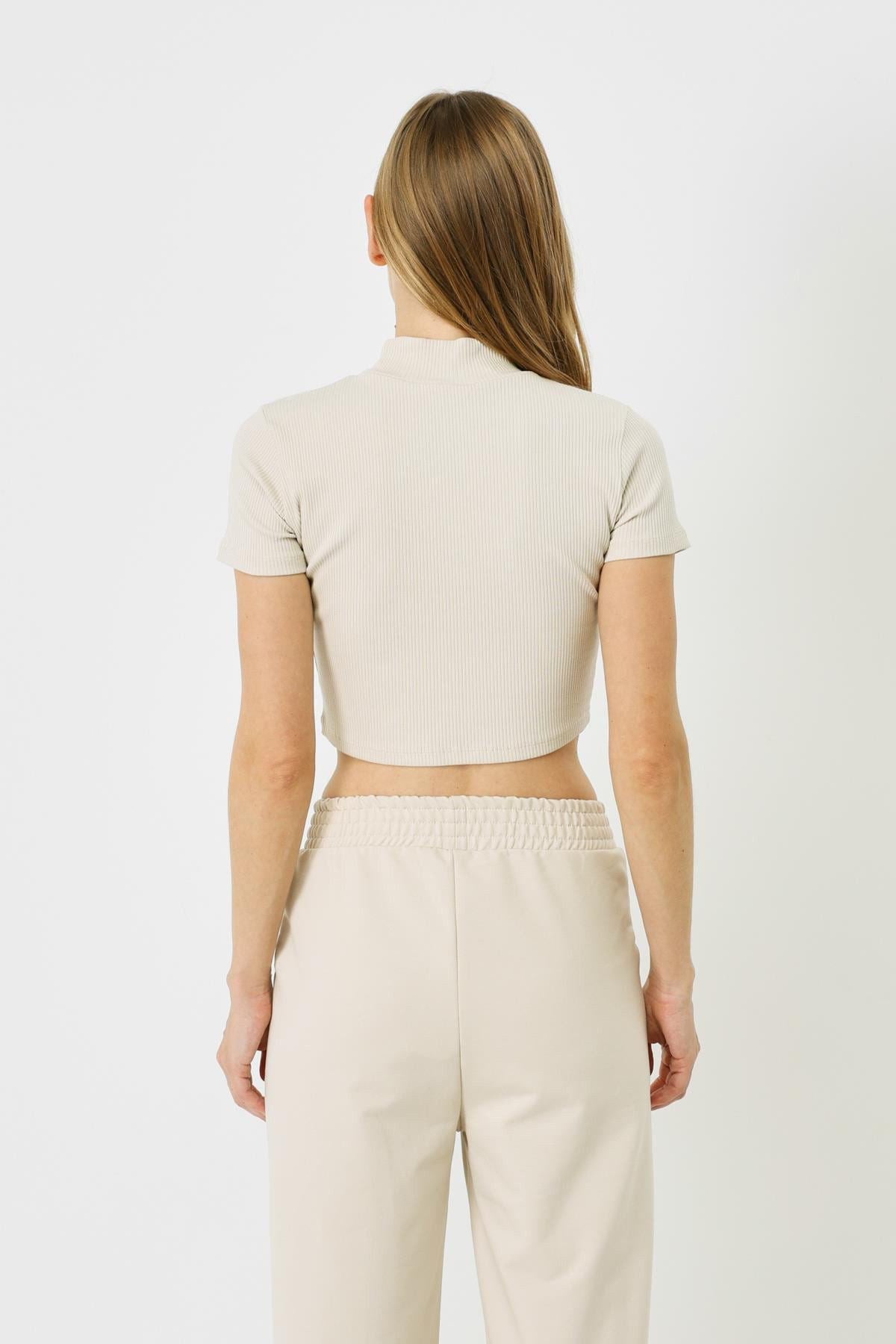 Damen Kurzarm-Rippbluse mit hohem Ausschnitt